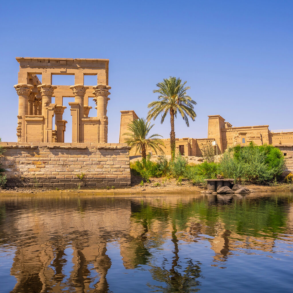 The beautiful temple of Philae and the Greco-Roman buildings seen from the Nile river, a temple dedicated to Isis, goddess of love. Aswan. Egyptian